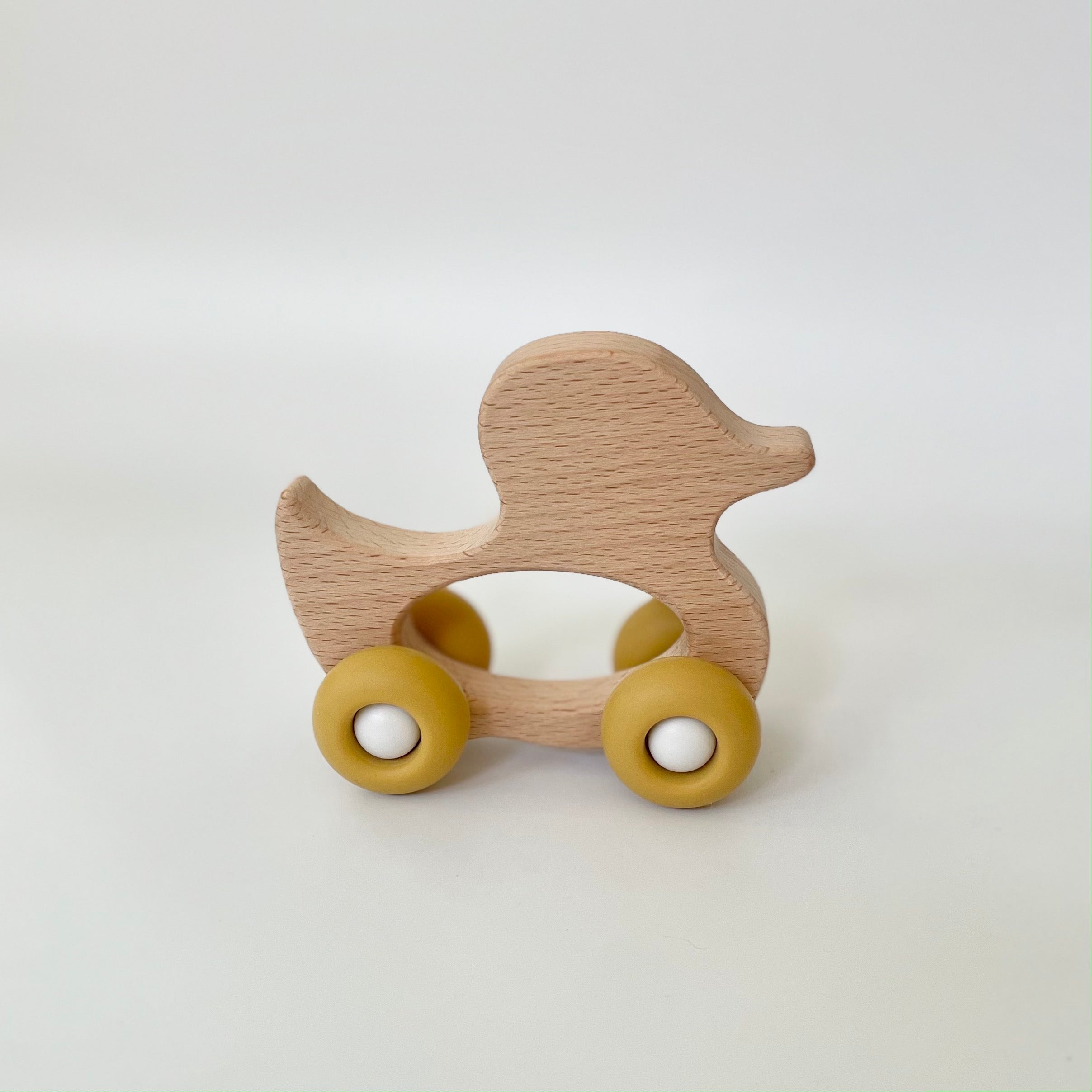 Wooden toy duck hotsell on wheels